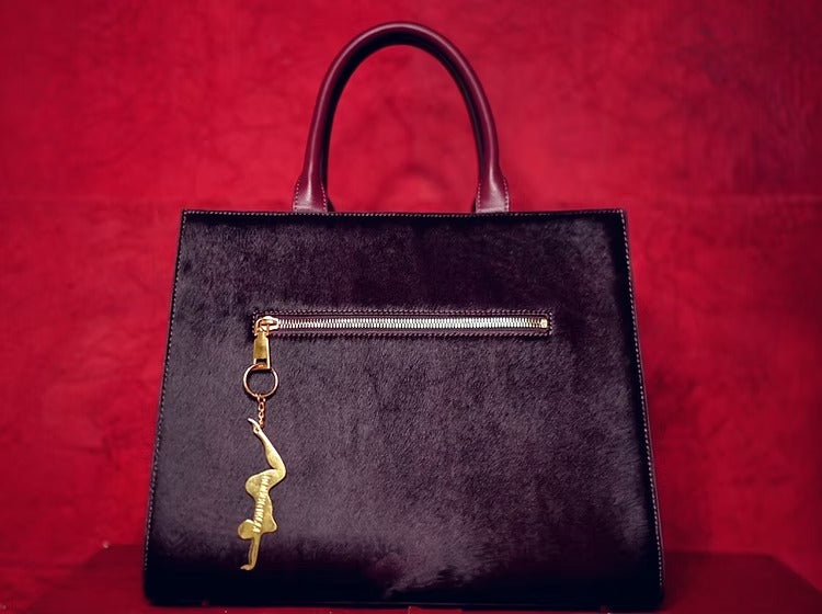 Golden Sculptural Hand Bag