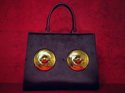 Golden Sculptural Hand Bag