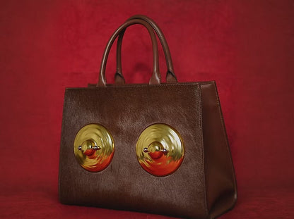 Golden Sculptural Hand Bag
