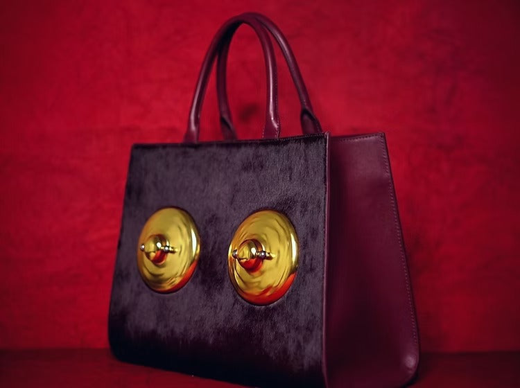 Golden Sculptural Hand Bag