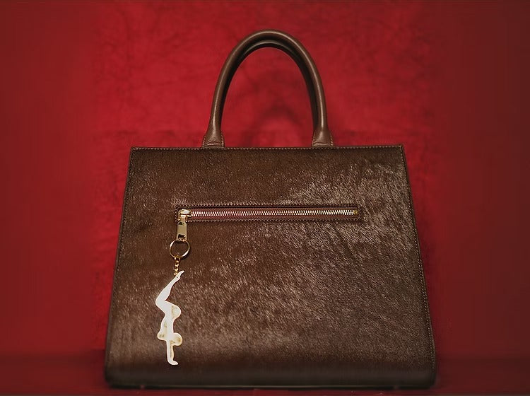 Golden Sculptural Hand Bag