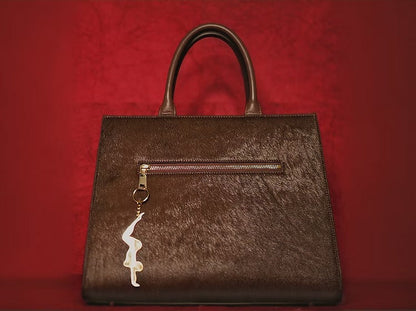 Golden Sculptural Hand Bag